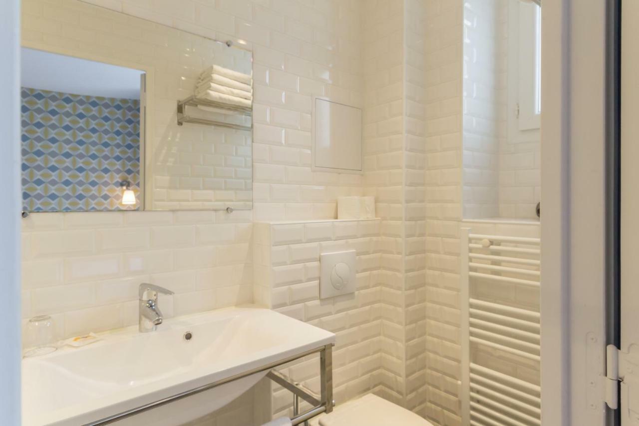 Les Toits De Paris Bed & Breakfast Exterior foto